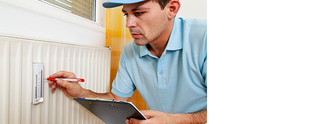 Technician inspecting a system